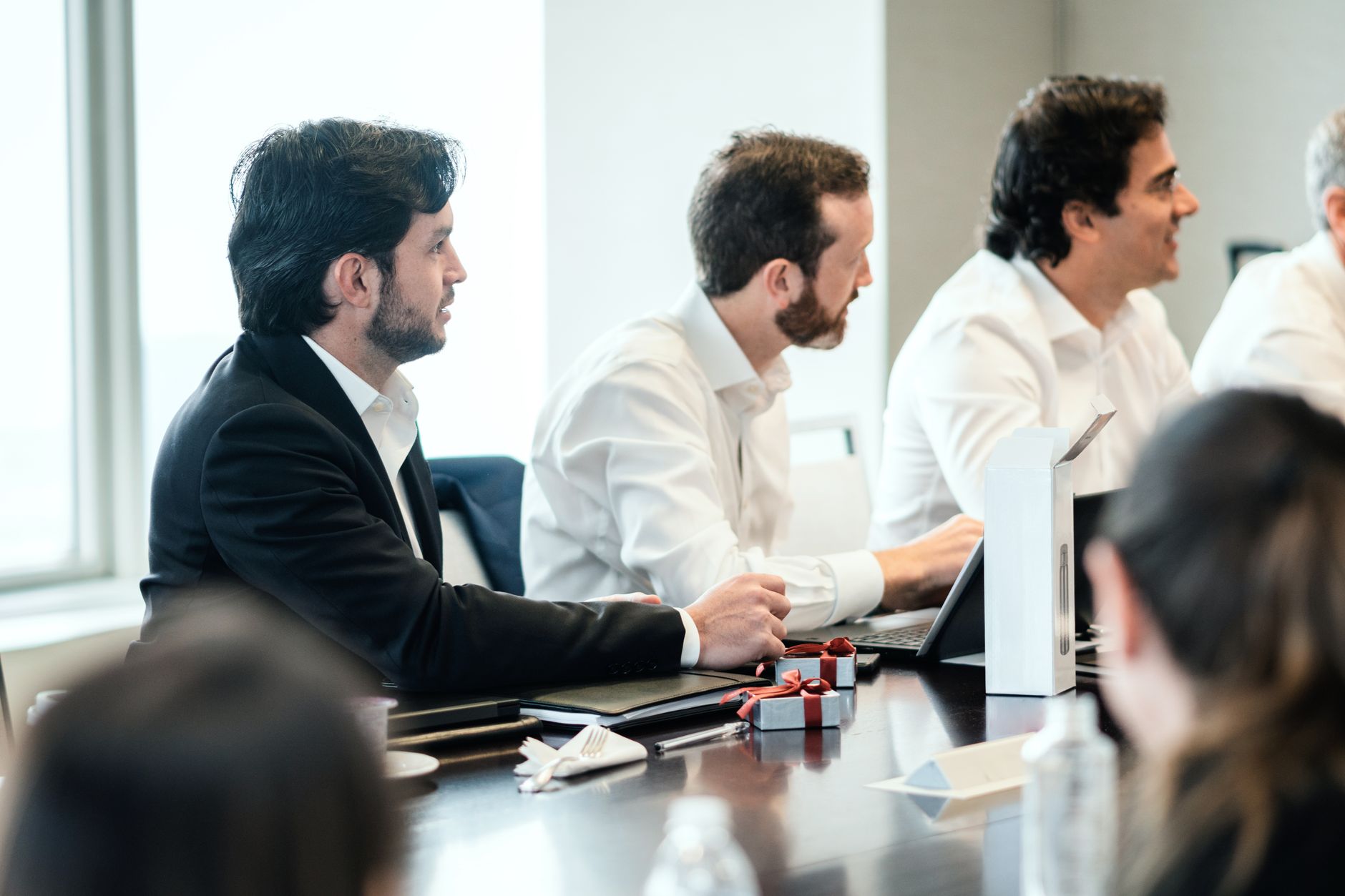 Corporate planners in boardroom setting