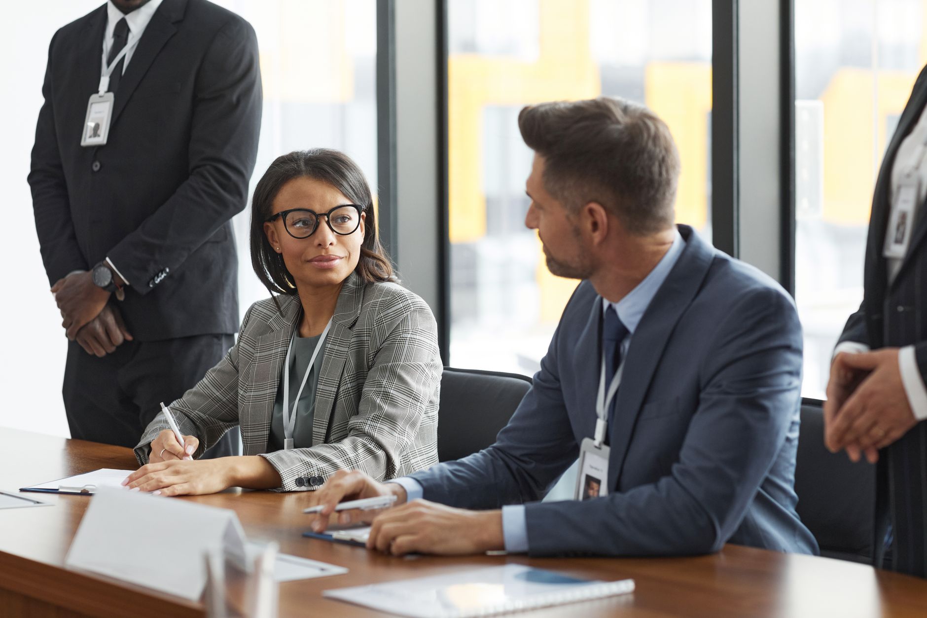 Corporate negotiations in board room conference